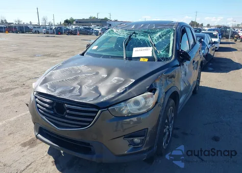 2016 Mazda Cx-5 Grand Touring z USA, uszkodzony, nr VIN JM3KE2DY6G0660406